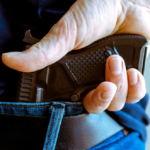 man with a gun in his back pocket in Chicago